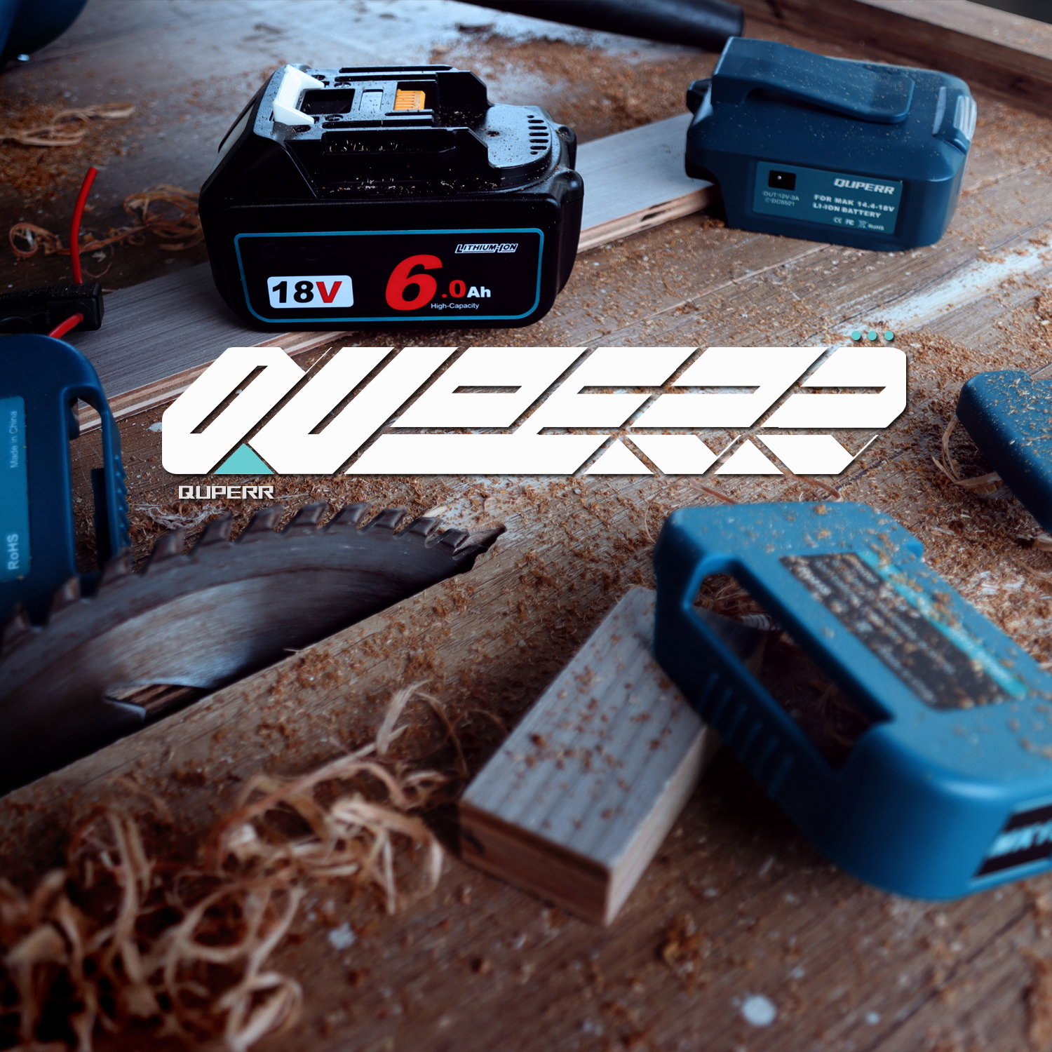 QUPERR batteries and cordless accessories on a workshop bench